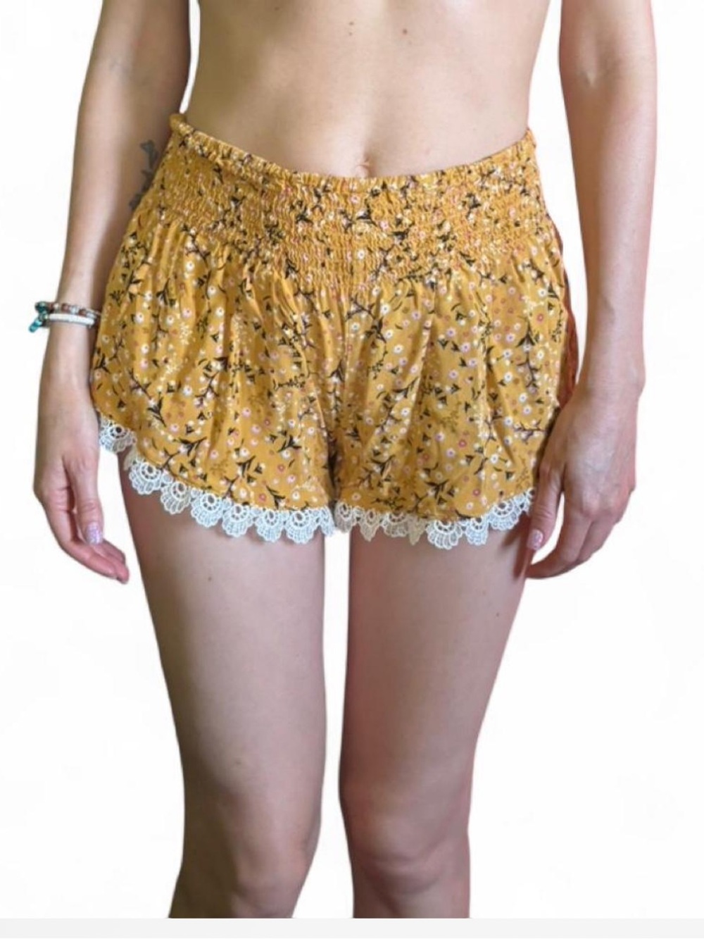 Yellow floral shorts with white lace trim 
Rayon and lace Coquette Beachy Sm